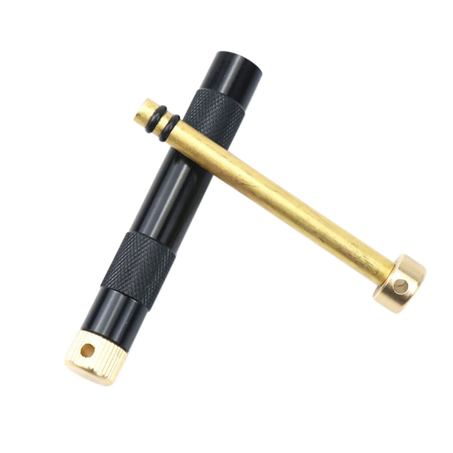 Portable Compression Fire Tube Metal Fire Starting Tool.